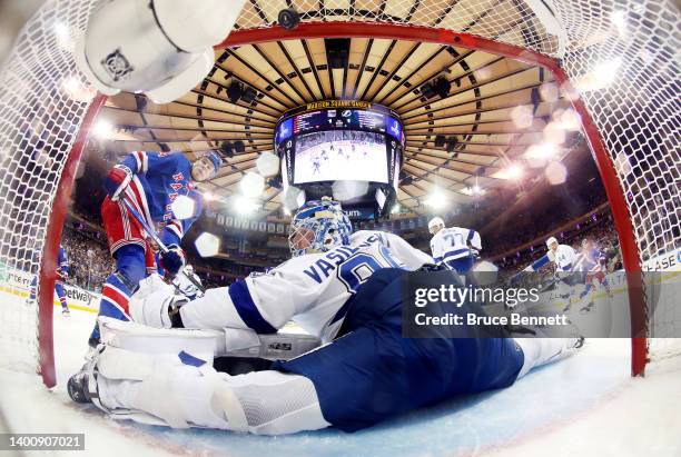 Kaapo Kakko of the New York Rangers scores a first period goal against Andrei Vasilevskiy of the Tampa Bay Lightning in Game Two of the Eastern...