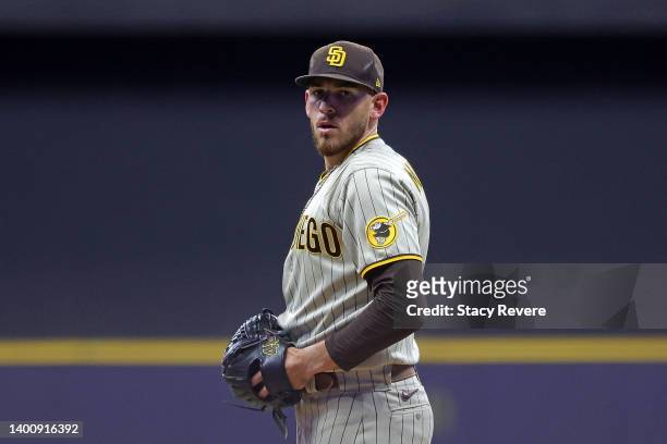 Joe Musgrove of the San Diego Padres prepares to throw a pitch during the seventh inning against the Milwaukee Brewers at American Family Field on...