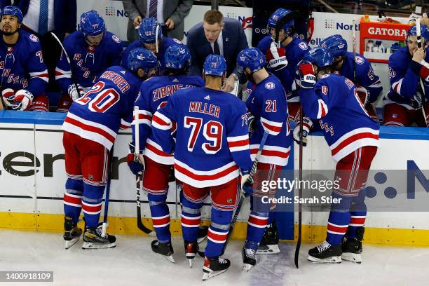 The New York Rangers huddle during the third period against the Tampa Bay Lightning in Game Two of the Eastern Conference Final of the 2022 Stanley...