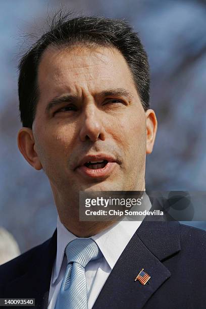 Wisconsin Gov. Scott Walker makes remarks to the news media after a meeting of the National Governors Association with President Barack Obama at the...