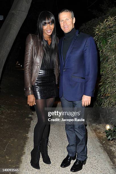 Naomi Campbell and Vladislav Doronin attend the Roberto Cavalli private dinner during Milan Womenswear Fashion Week at the Just Cavalli Cafe on...