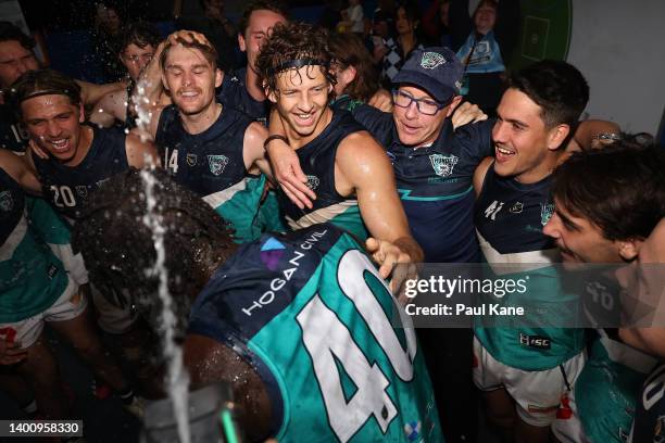 Nat Fyfe of the Thunder celebrates with team mates after winningd the round seven WAFL match between the Subiaco Lions and Peel Thunder at...