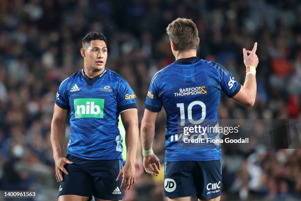 Roger Tuivasa-Shek of the Blues with Beauden Barrett, captain of the Blues during the quarter final Super Rugby Pacific match between the Blues and...