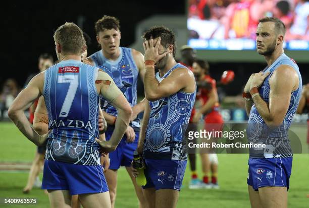 The Kangaroos are seen after they were defeated by the Suns during the round 12 AFL match between the Gold Coast Suns and the North Melbourne...