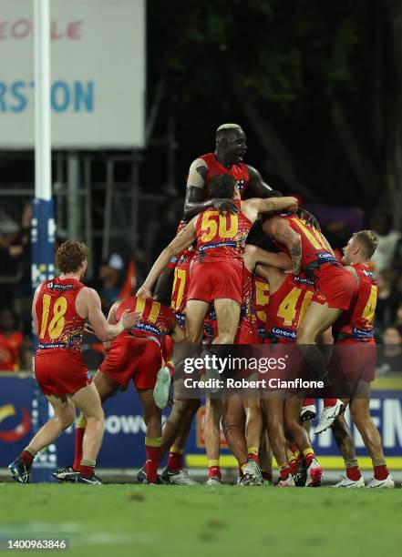 Caleb Graham of the Suns celebrates after scoring a goal during the round 12 AFL match between the Gold Coast Suns and the North Melbourne Kangaroos...