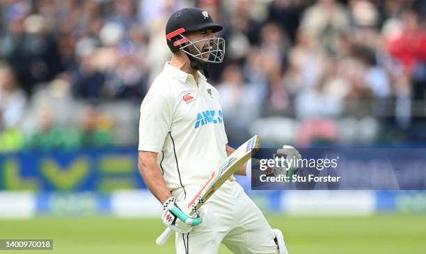 New Zealand batsman Daryl Mitchell celebrates reaching his century during day three of the first Test Match between England and New Zealand at Lord's...