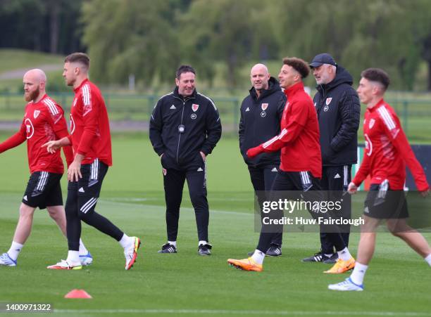 Rob Page Head Coach of Wales oversees the squad training session during the Wales FA training session ahead of their World Cup eliminator against...