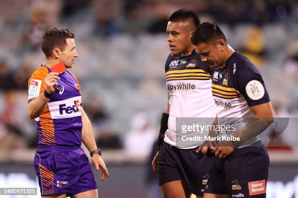 Referee Paul Williams shows Len Ikitau of the Brumbies a red card as Allan Alaalatoa of the Brumbies shows his frustration during the Super Rugby...