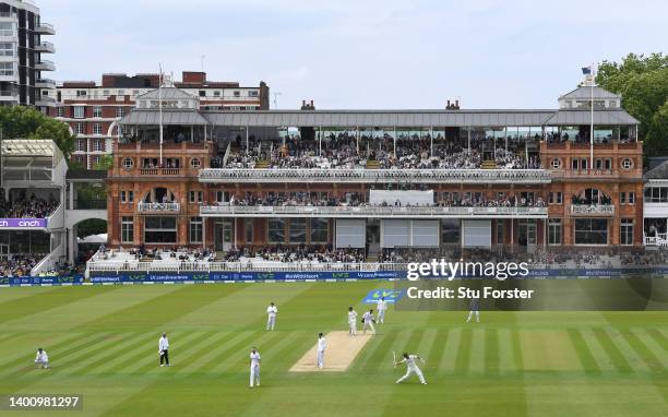 New Zealand batsman Daryl Mitchell celebrates reaching his century during day three of the first Test Match between England and New Zealand at Lord's...