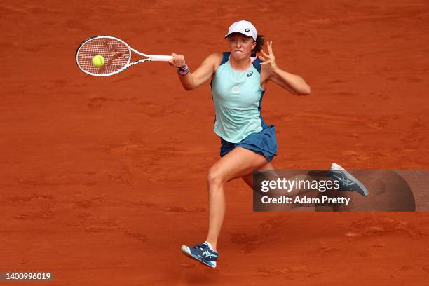 Iga Swiatek of Poland plays a forehand against Coco Gauff of The United States during the Women’s Singles final match on Day 14 of The 2022 French...