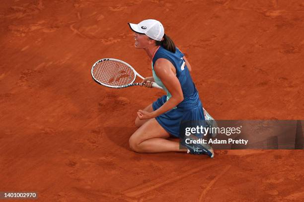 Iga Swiatek of Poland celebrates after winning match point against Coco Gauff of The United States during the Women’s Singles final match on Day 14...