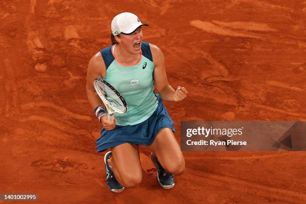 Iga Swiatek of Poland celebrates after winning match point against Coco Gauff of The United States during the Women’s Singles final match on Day 14...