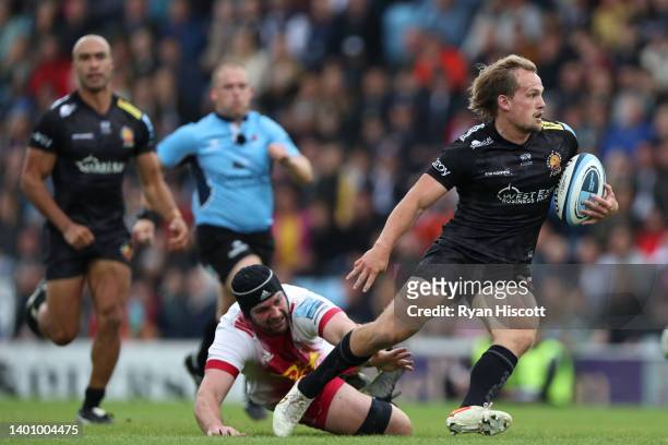 Matt Symons of Harlequins challenges Stu Townsend of Exeter Chiefs during the Gallagher Premiership Rugby match between Exeter Chiefs and Harlequins...