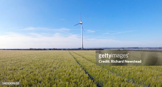 wind turbine - grain field stock-fotos und bilder