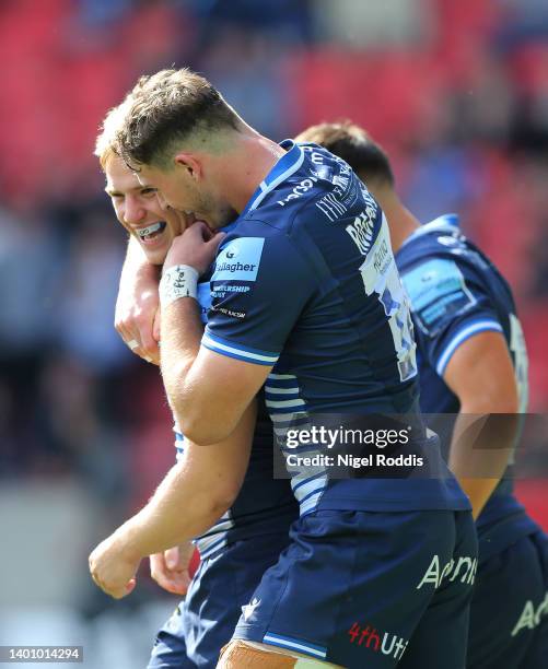 Arron Reed celebrates after scoring a try with Tom Roebuck of Sale Sharks during the Gallagher Premiership Rugby match between Sale Sharks and...