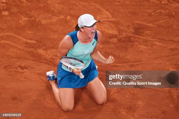 Iga Swiatek of Poland celebrates after winning Championship point against Coco Gauff of The United States during the Women’s Singles final match on...