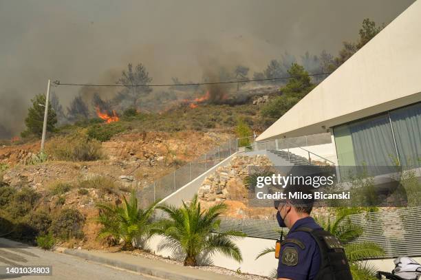 Wildfire in Voula suburb, on June 4, 2022 in Athens, Greece. Hot, dry weather and strong winds makes Greece vulnerable to wildfire outbreaks every...