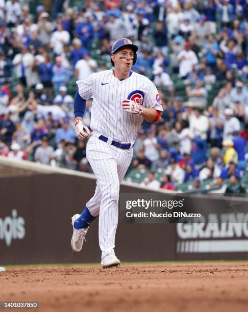 Frank Schwindel of the Chicago Cubs celebrates a home run during the fifth inning of Game One of a doubleheader against the St. Louis Cardinals at...