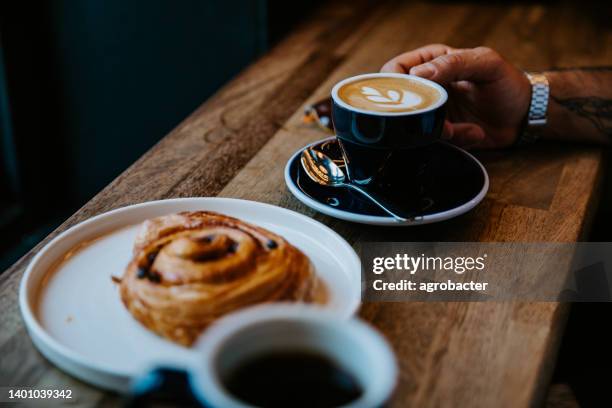 delicious flat white coffee with latte art in a cup - froth art stock pictures, royalty-free photos & images