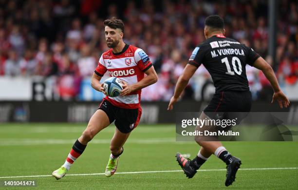 Adam Hastings of Gloucester takes on Manu Vunipola of Saracens during the Gallagher Premiership Rugby match between Gloucester Rugby and Saracens at...