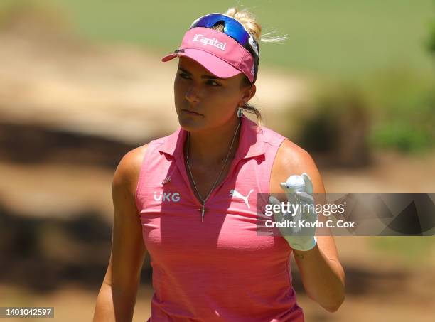 Lexi Thompson reacts after putting on the seventh green during the third round of the 77th U.S. Women's Open at Pine Needles Lodge and Golf Club on...