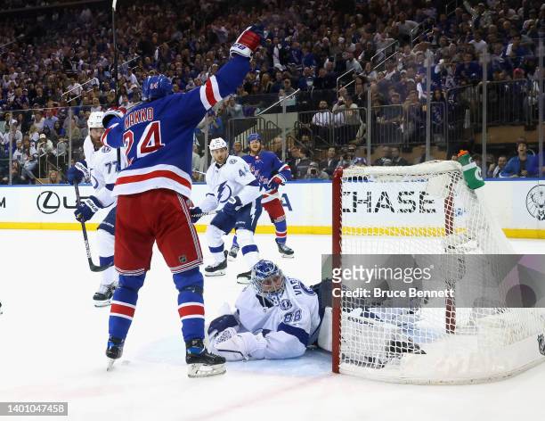 Alexis Lafreniere of the New York Rangers scores against Andrei Vasilevskiy of the Tampa Bay Lightning in Game Two of the Eastern Conference Final of...