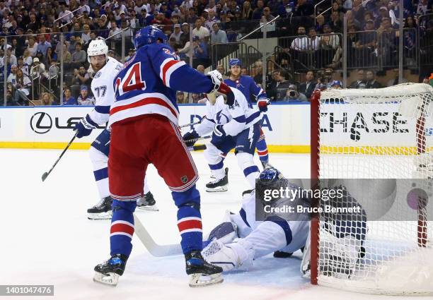 Alexis Lafreniere of the New York Rangers scores against Andrei Vasilevskiy of the Tampa Bay Lightning in Game Two of the Eastern Conference Final of...