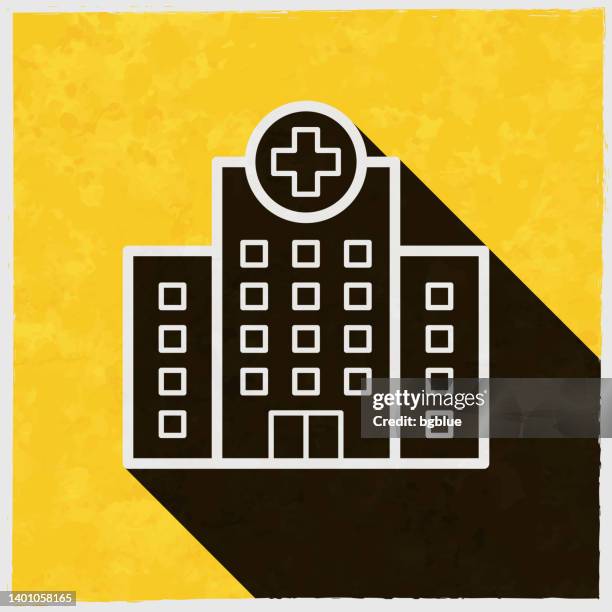 ilustraciones, imágenes clip art, dibujos animados e iconos de stock de edificio del hospital. icono con sombra larga sobre fondo amarillo texturizado - urgencias-hospital