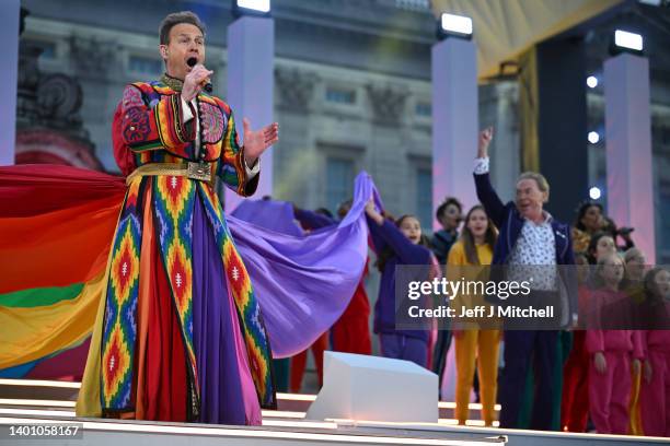 Andrew Lloyd Webber and Jason Donovan perform songs from Joseph and the Amazing Technicolor Dreamcoat onstage during the Platinum Party at the Palace...