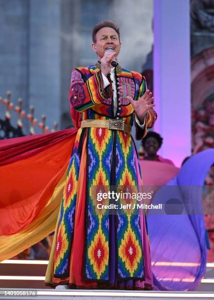 Jason Donovan performs songs from Joseph and the Amazing Technicolor Dreamcoat onstage during the Platinum Party at the Palace in front of Buckingham...