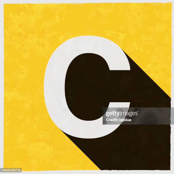 illustrations, cliparts, dessins animés et icônes de lettre c. icône avec une longue ombre sur fond jaune texturé - lettre majuscule
