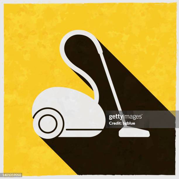 vacuum cleaner. icon with long shadow on textured yellow background - dirty carpet stock illustrations