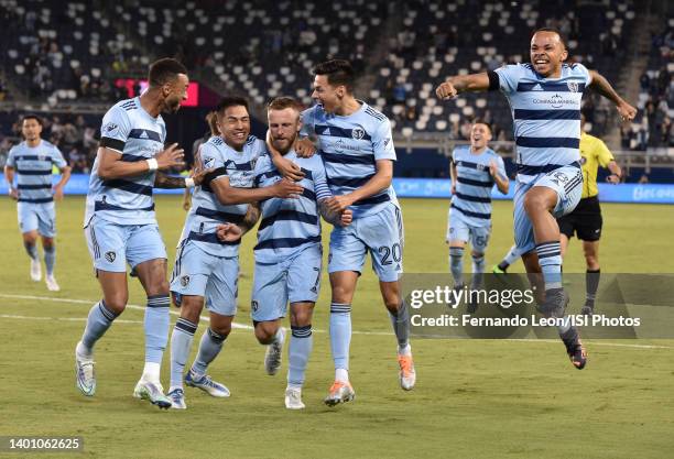 Khiry Shelton, Felipe Hernandez, Johnny Russell, Daniel Salloi and Logan Ndenbe of Sporting Kansas City celebrate Johnny"u2019s goal in the second...