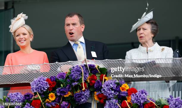 Lindsay Wallace, Peter Phillips and Princess Anne, Princess Royal watch the racing from the royal box as they attend The Epsom Derby at Epsom...