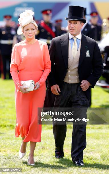 Peter Phillips and Lindsay Wallace attend The Epsom Derby at Epsom Racecourse on June 4, 2022 in Epsom, England.