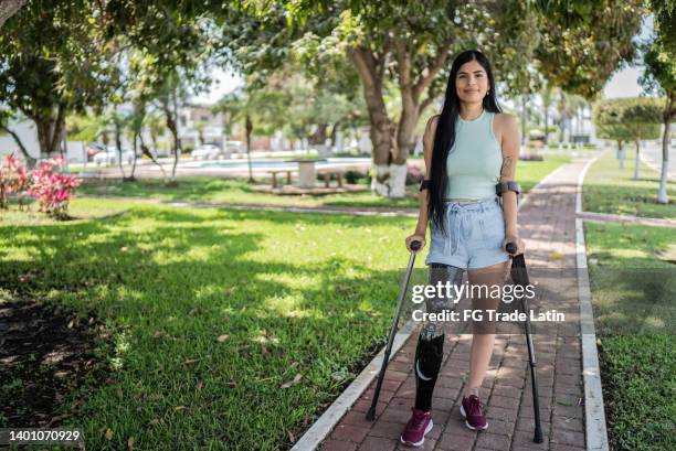 portrait of a woman with leg prosthesis - leg amputated stock pictures, royalty-free photos & images