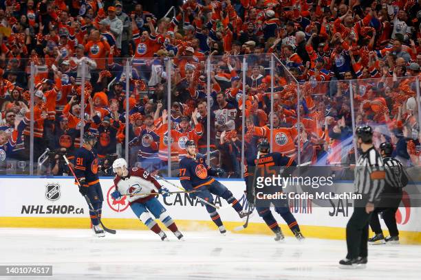 Fans cheer as Connor McDavid of the Edmonton Oilers celebrates scoring a goal in the first period against the Colorado Avalanche in Game Three of the...