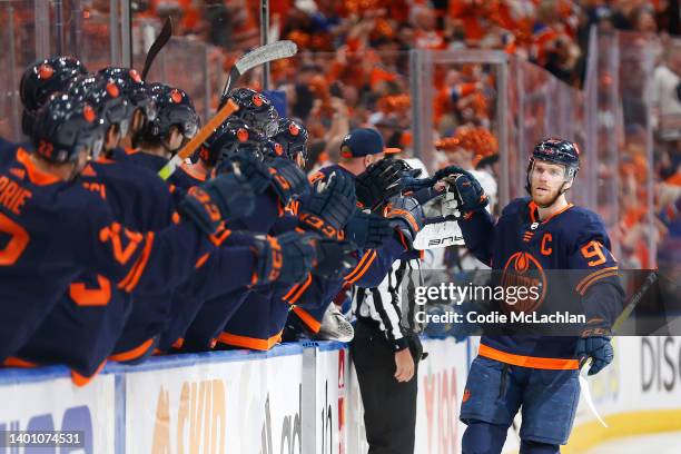Connor McDavid of the Edmonton Oilers celebrates with teammates after scoring a goal in the first period against the Colorado Avalanche in Game Three...