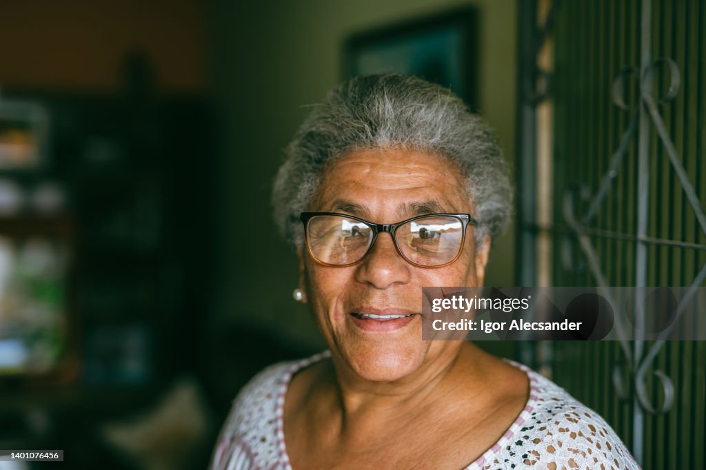 Portrait of an elderly woman at home