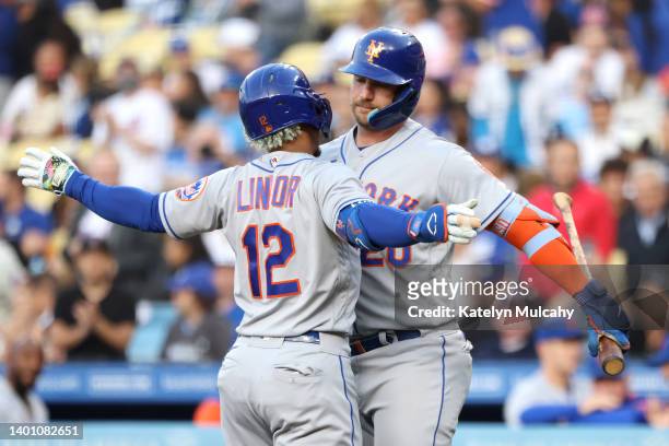 Francisco Lindor of the New York Mets celebrates his home run with teammate Pete Alonso during the first inning against the Los Angeles Dodgers at...