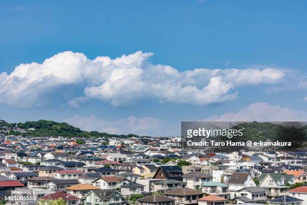 summer clouds over the residential district in kanagawa of japan - 住宅地 ストックフォトと画像