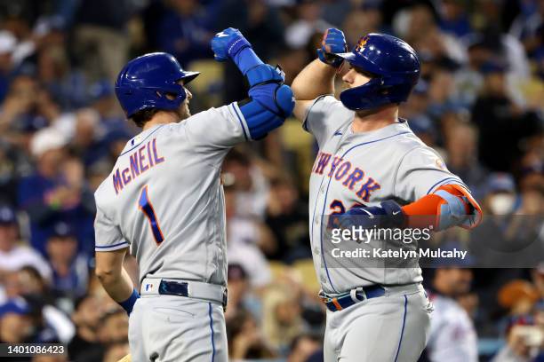 Pete Alonso of the New York Mets celebrates a two run home run with teammate Jeff McNeil during the third inning against the Los Angeles Dodgers at...