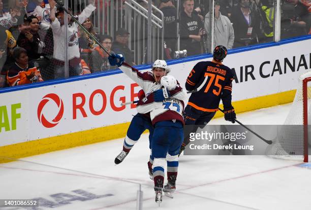 Compher of the Colorado Avalanche celebrates his third period goal with teammate Bowen Byram against the Edmonton Oilers in Game Three of the Western...