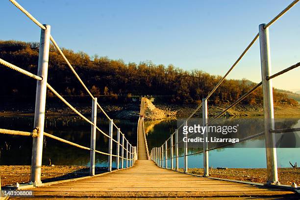 floating bridge over river - vitoria stock-fotos und bilder