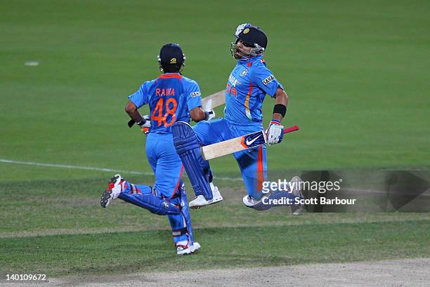 Virat Kohli of India celebrates after reaching his century during the One Day International match between India and Sri Lanka at Bellerive Oval on...