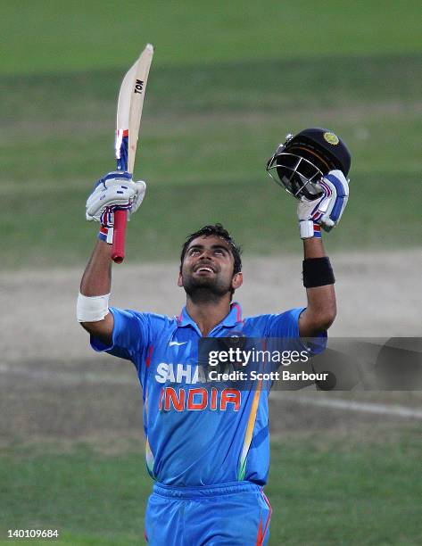 Virat Kohli of India celebrates after reaching his century during the One Day International match between India and Sri Lanka at Bellerive Oval on...