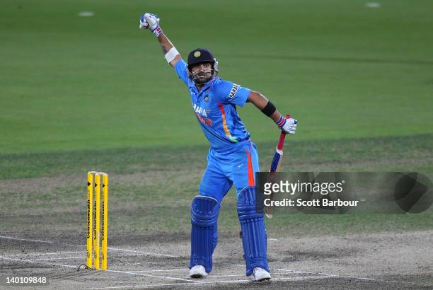 Virat Kohli of India celebrates after hitting the winning runs during the One Day International match between India and Sri Lanka at Bellerive Oval...