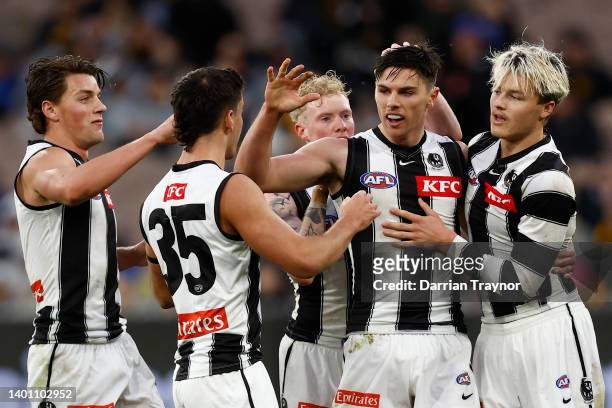 Oliver Henry of the Magpies celebrates a goal during the round 12 AFL match between the Hawthorn Hawks and the Collingwood Magpies at Melbourne...