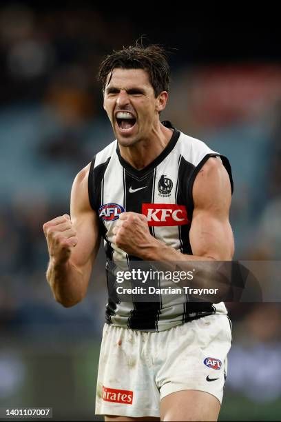 Scott Pendlebury of the Magpies celebrates on the final sirern during the round 12 AFL match between the Hawthorn Hawks and the Collingwood Magpies...