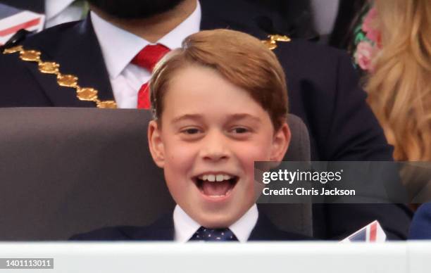 Prince George of Cambridge watch Paddington Bear and HM The Queen on screen during the Platinum Party at the Palace in front of Buckingham Palace on...